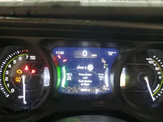 2024 Jeep Wrangler Sahara with VIN 1C4RJXP60RW257385, listed as a Copart auction lot 47660655 with 20,899 mi miles and Salvage title. Bid and sale history available at DreamBid. Image 9.