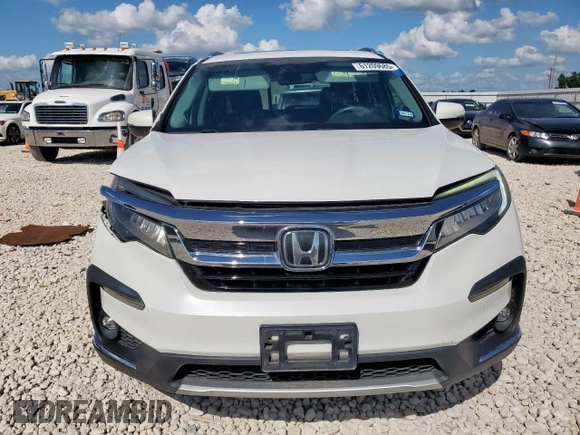 2020 Honda Pilot Touring 7-Passenger with VIN 5FNYF6H69LB018905, listed as a Copart auction lot 61209685 with 61,637 mi miles and Salvage title. Bid and sale history available at DreamBid. Image 5.