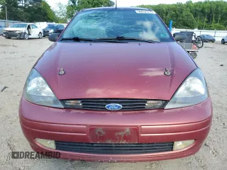 2001 Ford Focus ZX3 z VIN 3FAFP31331R219011, wystawiony jako Copart lot #56032315 z przebiegiem 365 925 mil mil oraz Szkoda całkowita • Salvage title. Historia ofert i sprzedaży dostępna na DreamBid. Obrazek 5.