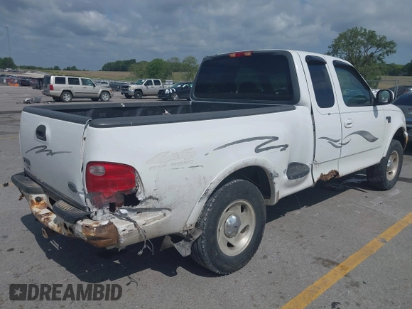 2000 Ford F-150 z VIN 2FTRX08W3YCA83858, wystawiony jako IAAI lot #42569957 z przebiegiem Nie podano mil oraz . Historia ofert i sprzedaży dostępna na DreamBid. Obrazek 4.