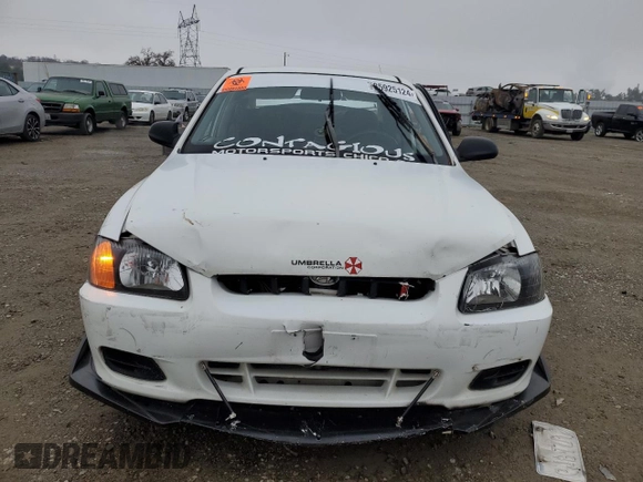 2002 Hyundai Accent GL with VIN KMHCG45C92U271388, listed as a Copart auction lot 85925124 with 98,390 mi miles and Salvage Title. Bid and sale history available at carsss.com. Image 5.