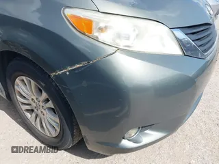 2014 Toyota Sienna XLE with VIN 5TDYK3DC2ES448876, listed as a IAAI auction lot 42519351 with 154,601 mi miles and . Bid and sale history available at DreamBid. Image 17.