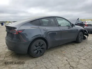 2024 Tesla Model Y Long Range z VIN 7SAYGDEE9RA293776, wystawiony jako Copart lot #51289225 z przebiegiem 12 990 mil mil oraz Szkoda całkowita • Salvage title. Historia ofert i sprzedaży dostępna na DreamBid. Obrazek 3.