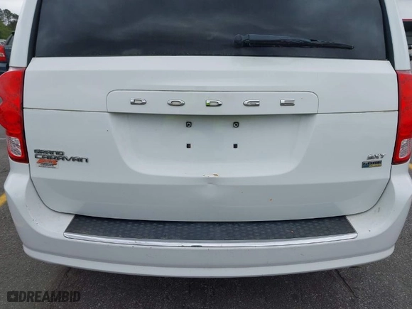 2014 Dodge Grand Caravan SXT with VIN 2C4RDGCG0ER390849, listed as a IAAI auction lot 41957368 with 98,044 mi miles. Bid and sale history available at carsss.com. Image 14.