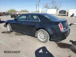 2012 Chrysler 300 with VIN 2C3CCAAG9CH201079, listed as a Copart auction lot 80343504 with 137,593 mi miles and Salvage Title. Bid and sale history available at DreamBid. Image 2.