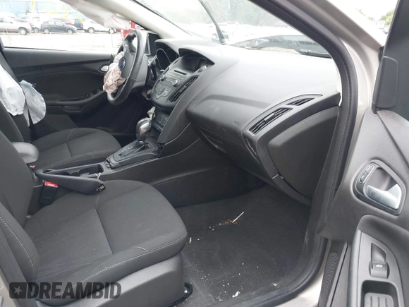 2016 Ford Focus SE z VIN 1FADP3F28GL300925, wystawiony jako IAAI lot #42563251 z przebiegiem 93 247 mil mil oraz . Historia ofert i sprzedaży dostępna na DreamBid. Obrazek 5.