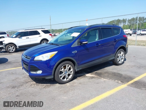 2013 Ford Escape SEL with VIN 1FMCU9H9XDUC19146, listed as a IAAI auction lot 42014526 with 167,600 mi miles. Bid and sale history available at carsss.com. Image 2.