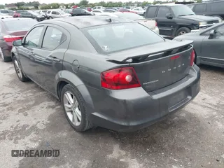 2014 Dodge Avenger SE with VIN 1C3CDZAB5EN234445, listed as a IAAI auction lot 42669108 with 82,930 mi miles and . Bid and sale history available at DreamBid. Image 3.