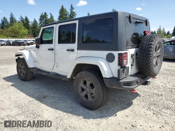 2014 Jeep Wrangler Unlimited Sahara z VIN 1C4BJWEG8EL188271, wystawiony jako Copart lot #59972535 z przebiegiem 130 314 mil mil oraz Szkoda całkowita • Salvage title. Historia ofert i sprzedaży dostępna na DreamBid. Obrazek 2.