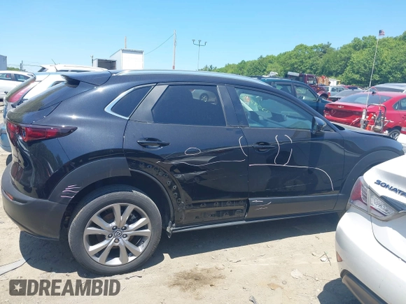 2022 Mazda CX-30 S Carbon Edition with VIN 3MVDMBCL3NM440188, listed as a IAAI auction lot 42259723 with 48,555 mi miles and . Bid and sale history available at DreamBid. Image 14.