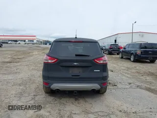 2013 Ford Escape SE with VIN 1FMCU0GX1DUD14948, listed as a IAAI auction lot 41876628 with 277,194 mi miles and . Bid and sale history available at DreamBid. Image 17.