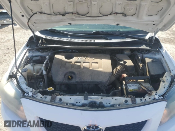 2009 Toyota Corolla with VIN 1NXBU40E69Z049866, listed as a Copart auction lot 52078625 with 149,943 mi miles and Salvage Title. Bid and sale history available at carsss.com. Image 12.