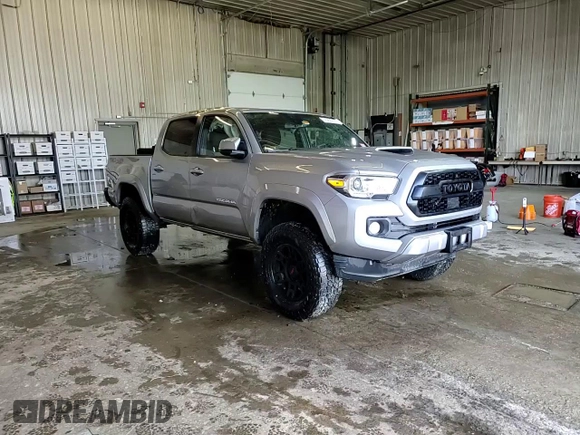 2020 Toyota Tacoma SR5 z VIN 5TFCZ5AN7LX222217, wystawiony jako Copart lot #45892765 z przebiegiem 79 098 mil mil oraz Szkoda całkowita • Salvage title. Historia ofert i sprzedaży dostępna na DreamBid. Obrazek 14.