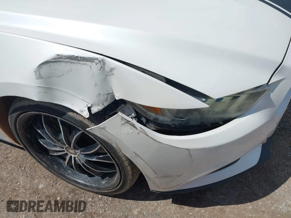 2017 Ford Mustang V6 с VIN 1FA6P8AM8H5235207, выставлен на аукционе IAAI как лот 42388120 с пробегом 105 450 миль миль и . История ставок и продаж доступна на DreamBid. Изображение 17.