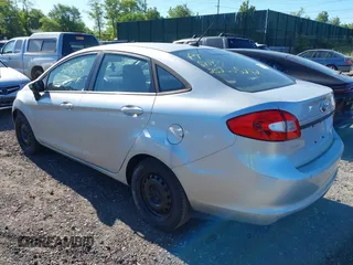 2013 Ford Fiesta S with VIN 3FADP4AJ6DM223132, listed as a IAAI auction lot 42317500 with 104,003 mi miles and . Bid and sale history available at DreamBid. Image 3.