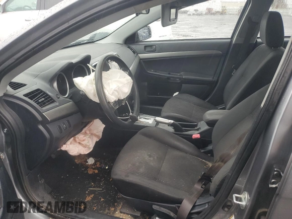 2014 Mitsubishi Lancer SE z VIN JA32V2FW8EU020237, wystawiony jako Copart lot #50333595 z przebiegiem 128 289 mil mil oraz Szkoda całkowita • Salvage title. Historia ofert i sprzedaży dostępna na DreamBid. Obrazek 7.