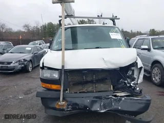 2019 GMC Savana Cargo Van with VIN 1GTW7AFG9K1154896, listed as a IAAI auction lot 41761872 with 183,541 mi miles. Bid and sale history available at carsss.com. Image 12.