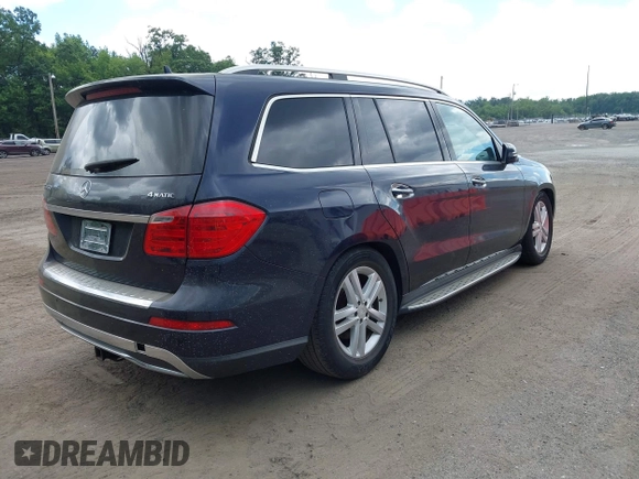 2014 Mercedes-Benz GL 450 с VIN 4JGDF7CE1EA286051, выставлен на аукционе IAAI как лот 42549323 с пробегом 143 640 миль миль и . История ставок и продаж доступна на DreamBid. Изображение 4.