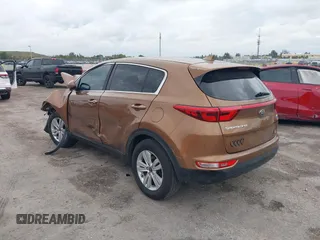 2018 Kia Sportage LX with VIN KNDPM3AC9J7481047, listed as a IAAI auction lot 41636184 with 160,385 mi miles. Bid and sale history available at carsss.com. Image 3.