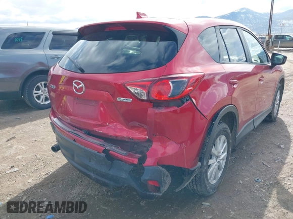 2014 Mazda CX-5 Touring with VIN JM3KE2CY3E0355296, listed as a IAAI auction lot 41688625 with 164,390 mi miles. Bid and sale history available at carsss.com. Image 6.