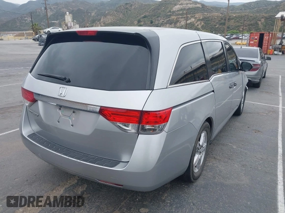 2014 Honda Odyssey LX z VIN 5FNRL5H28EB064426, wystawiony jako IAAI lot #42207634 z przebiegiem 169 706 mil mil oraz . Historia ofert i sprzedaży dostępna na DreamBid. Obrazek 4.