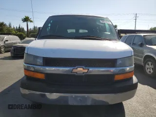2013 Chevrolet Express Passenger 1LT z VIN 1GAZGYFG7D1130758, wystawiony jako Copart lot #59625915 z przebiegiem 152 806 mil mil oraz Szkoda całkowita • Salvage title. Historia ofert i sprzedaży dostępna na DreamBid. Obrazek 5.