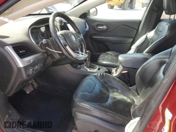2014 Jeep Cherokee Trailhawk with VIN 1C4PJMBS7EW157305, listed as a Copart auction lot 49436685 with 138,446 mi miles and Salvage Title. Bid and sale history available at carsss.com. Image 7.
