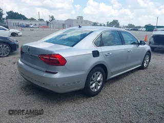 2016 Volkswagen Passat S with VIN 1VWAT7A33GC040009, listed as a IAAI auction lot 42582361 with 91,961 mi miles and . Bid and sale history available at DreamBid. Image 4.