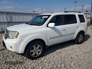 2010 Honda Pilot Touring z VIN 5FNYF4H90AB035233, wystawiony jako Copart lot #65888085 z przebiegiem 214 205 mil mil oraz Czysty tytuł • Clean title. Historia ofert i sprzedaży dostępna na DreamBid. Obrazek 1.