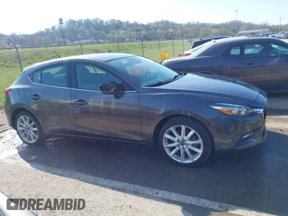 2017 Mazda 3 Touring with VIN 3MZBN1L70HM102817, listed as a IAAI auction lot 41867063 with 100,307 mi miles and . Bid and sale history available at DreamBid. Image 13.