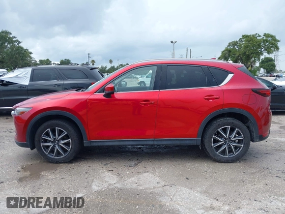 2018 Mazda CX-5 Grand Touring with VIN JM3KFADM5J0437365, listed as a IAAI auction lot 42657919 with 96,760 mi miles and . Bid and sale history available at DreamBid. Image 14.