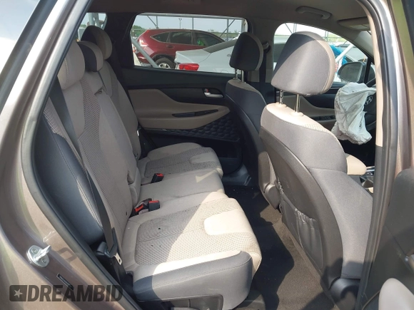 2020 Hyundai Santa Fe SE with VIN 5NMS23AD6LH220012, listed as a IAAI auction lot 42317046 with 141,055 mi miles and . Bid and sale history available at DreamBid. Image 8.