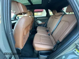2021 Audi Q3 Premium z VIN WA1AUCF3XM1102363, wystawiony jako Copart lot #58672195 z przebiegiem 208 956 mil mil oraz Tytuł czysty. Historia ofert i sprzedaży dostępna na DreamBid. Obrazek 6.