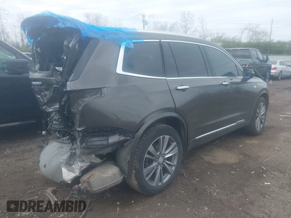 2020 Cadillac XT6 FWD Premium Luxury with VIN 1GYKPCRS0LZ136228, listed as a IAAI auction lot 41912953 with Not provided miles and . Bid and sale history available at DreamBid. Image 4.