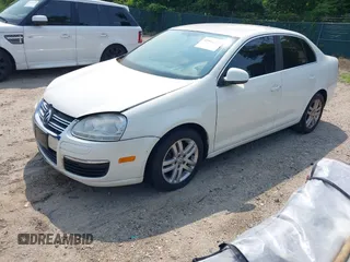 2007 Volkswagen Jetta 2.5 z VIN 3VWRG71K77M062978, wystawiony jako IAAI lot #42415517 z przebiegiem 168 159 mil mil oraz . Historia ofert i sprzedaży dostępna na DreamBid. Obrazek 2.