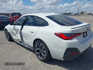 2024 BMW i4 eDrive35 z VIN WBY43AW02RFS79370, wystawiony jako IAAI lot #41887964 z przebiegiem 11 910 mil mil oraz . Historia ofert i sprzedaży dostępna na DreamBid. Obrazek 3.