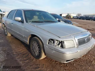 2008 Mercury Grand Marquis LS with VIN 2MEFM75V08X606745, listed as a IAAI auction lot 41437723 with 239,535 mi miles. Bid and sale history available at carsss.com. Image 1.