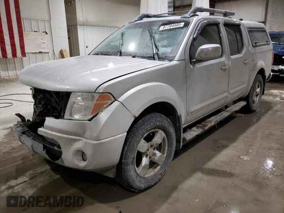2006 Nissan Frontier LE with VIN 1N6AD07W96C436210, listed as a Copart auction lot 87704505 with 119,485 mi miles and Salvage title. Bid and sale history available at DreamBid. Image 1.
