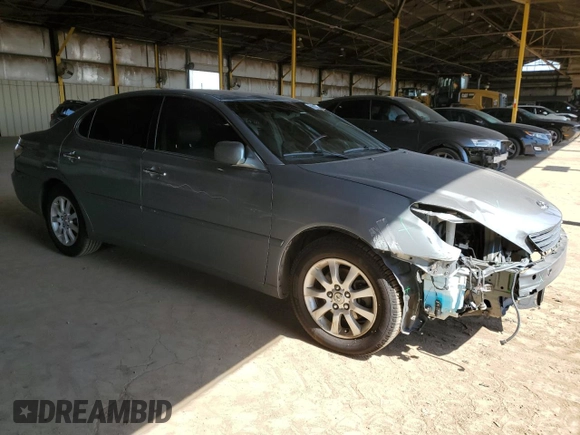 2002 Lexus ES 300 with VIN JTHBF30G720079044, listed as a Copart auction lot 59610445 with 145,310 mi miles and Salvage title. Bid and sale history available at DreamBid. Image 4.