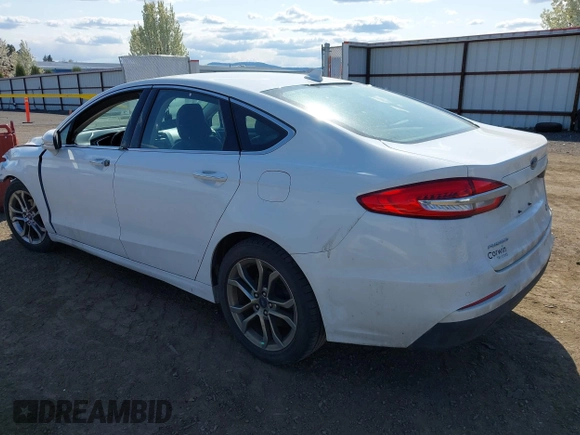 2019 Ford Fusion SEL with VIN 3FA6P0CD8KR117614, listed as a IAAI auction lot 42105025 with 135,801 mi miles and . Bid and sale history available at DreamBid. Image 3.