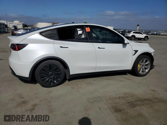 2021 Tesla Model Y Standard Range z VIN 5YJYGDED9MF110473, wystawiony jako Copart lot #53850085 z przebiegiem 46 242 mil mil oraz Szkoda całkowita • Salvage title. Historia ofert i sprzedaży dostępna na DreamBid. Obrazek 3.