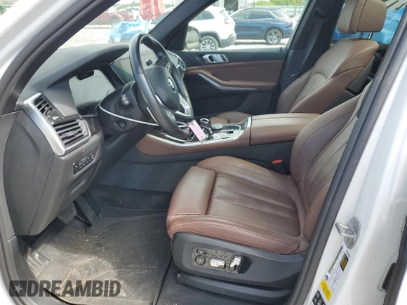 2019 BMW X5 xDrive40i with VIN 5UXCR6C5XKLK80703, listed as a Copart auction lot 63473495 with 57,260 mi miles and Salvage title. Bid and sale history available at DreamBid. Image 7.