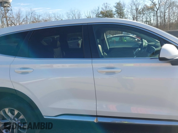2019 Hyundai Santa Fe SE with VIN 5NMS2CAD5KH011357, listed as a IAAI auction lot 40918980 with 98,851 mi miles. Bid and sale history available at carsss.com. Image 13.