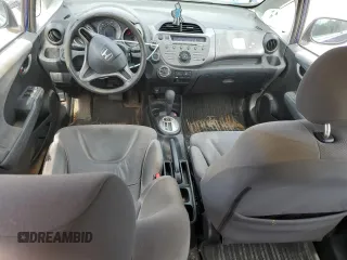 2009 Honda Fit with VIN JHMGE882X9S007865, listed as a Copart auction lot 61025875 with 159,919 mi miles and Clean title. Bid and sale history available at DreamBid. Image 8.
