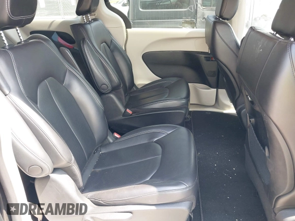 2023 Chrysler Pacifica Hybrid Touring L with VIN 2C4RC1L75PR592251, listed as a IAAI auction lot 42037873 with 44,428 mi miles and . Bid and sale history available at DreamBid. Image 8.