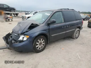 2007 Chrysler Town & Country SWB with VIN 1A4GJ45RX7B173625, listed as a Copart auction lot 87371914 with 106,826 mi miles and Salvage Title. Bid and sale history available at carsss.com. Image 1.