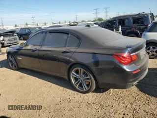 2015 BMW 7 Series 740Li with VIN WBAYE4C56FD138966, listed as a Copart auction lot 69240874 with 94,558 mi miles and Salvage Title. Bid and sale history available at DreamBid. Image 2.