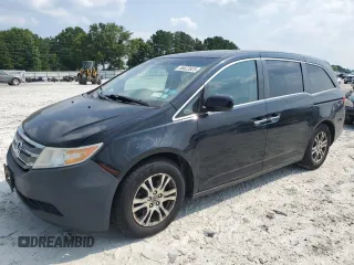 2013 Honda Odyssey EX-L with VIN 5FNRL5H6XDB052330, listed as a Copart auction lot 58823925 with 163,289 mi miles and Salvage title. Bid and sale history available at DreamBid. Image 1.