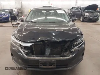 2020 Volkswagen Passat SE with VIN 1VWWA7A3XLC021477, listed as a IAAI auction lot 42473029 with 96,434 mi miles and . Bid and sale history available at DreamBid. Image 13.