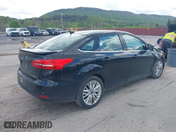 2015 Ford Focus Titanium с VIN 1FADP3J28FL213712, выставлен на аукционе IAAI как лот 42158433 с пробегом 173 696 миль миль и . История ставок и продаж доступна на DreamBid. Изображение 4.